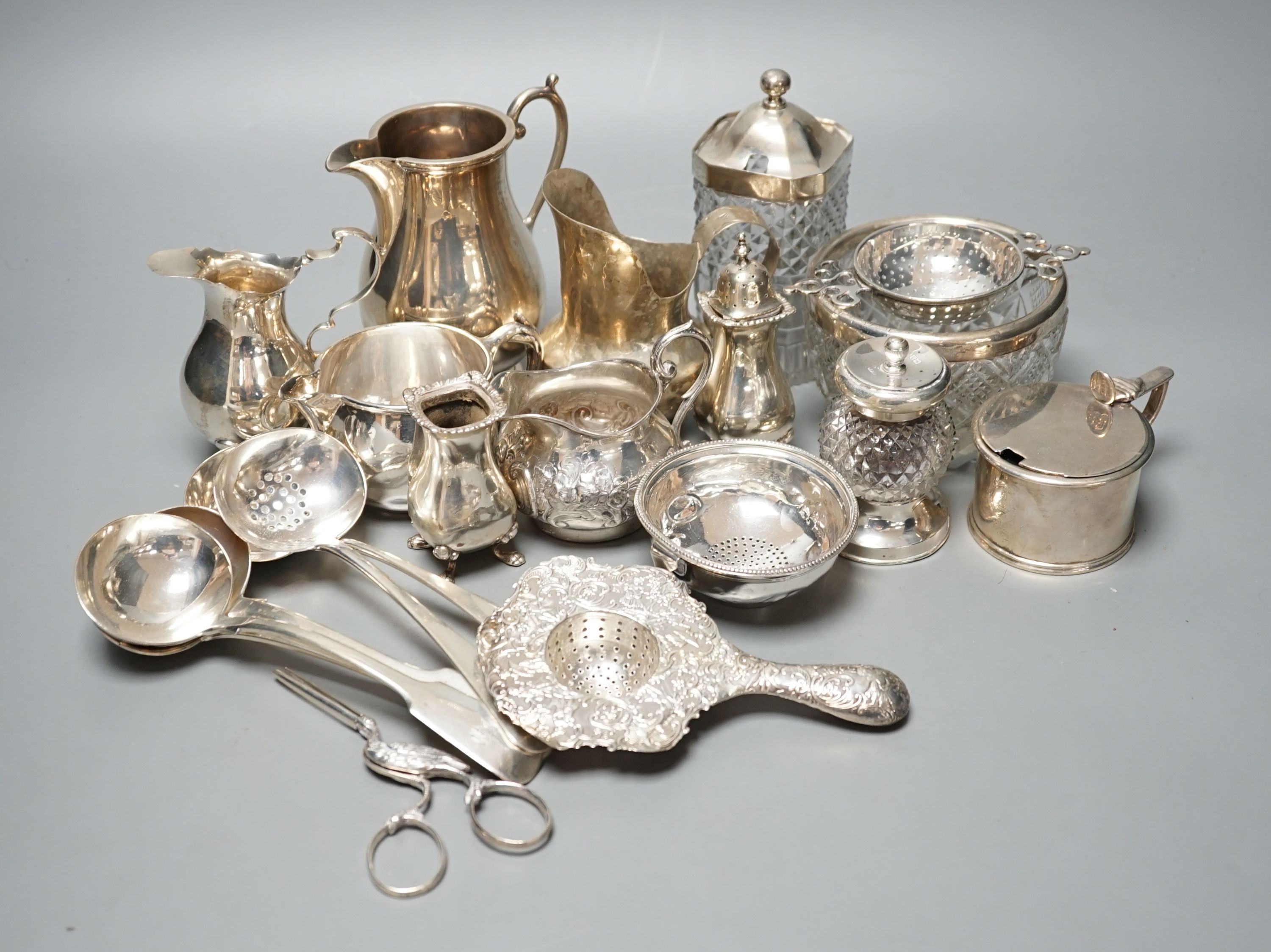 A mixed collection of small silver and sterling items, to include five assorted small ladles, cream jugs, Georgian mustard, bowls etc.